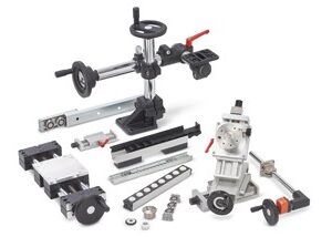 Adjusting, moving with guides, spindles and ball rollers